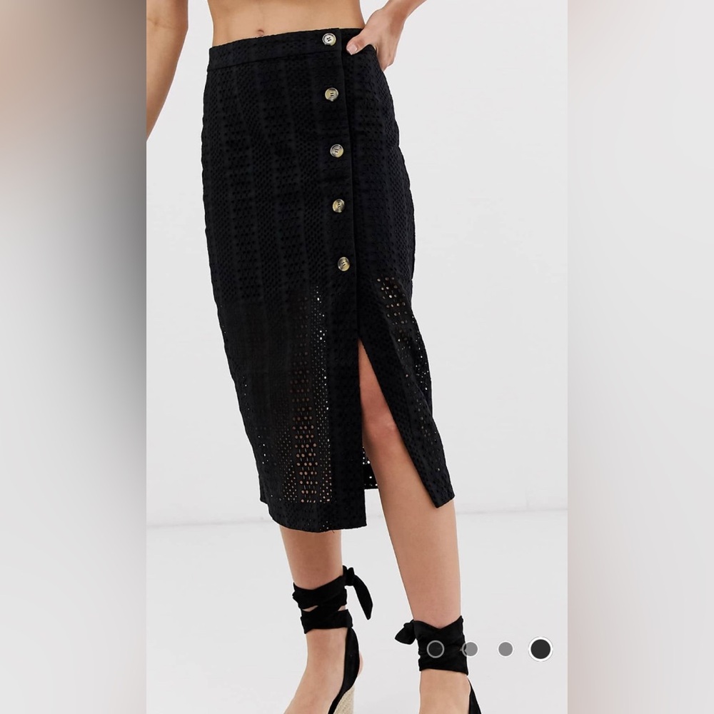 Black eyelet see-thru skirt with tortoise shell buttons